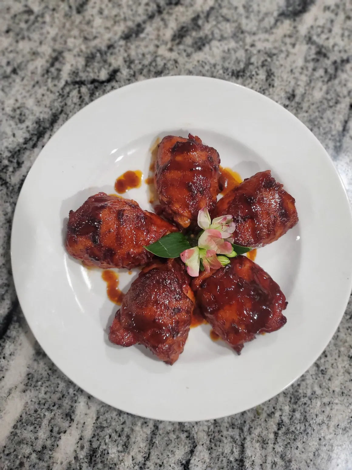 Wings Garnished With Flowers - Wadadli Flare Catering